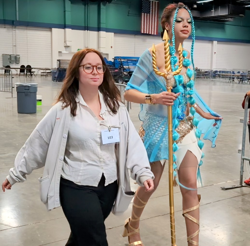 Maycie and Morgan enter the competition arena.