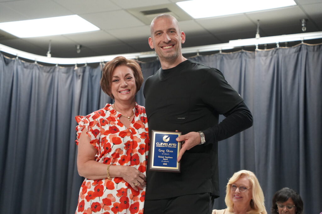 Lee Ann Mayse poses with one of her students at the Radiography pinning ceremony.