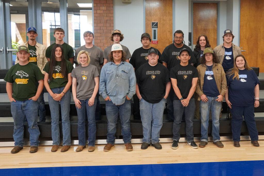 The 16 competitors in the welding competition.
