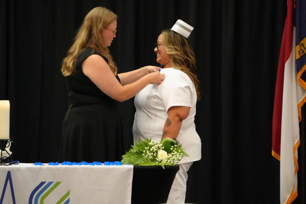 May being pinned at the practical nursing pinning ceremony.